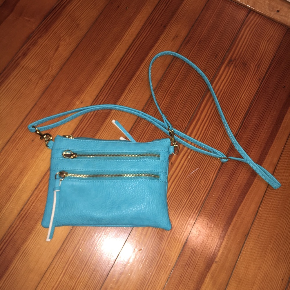 Turquoise convertible shoulder bag and wristlet